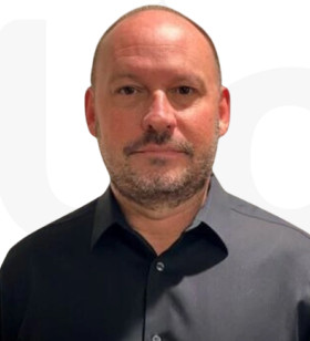 Mark E.